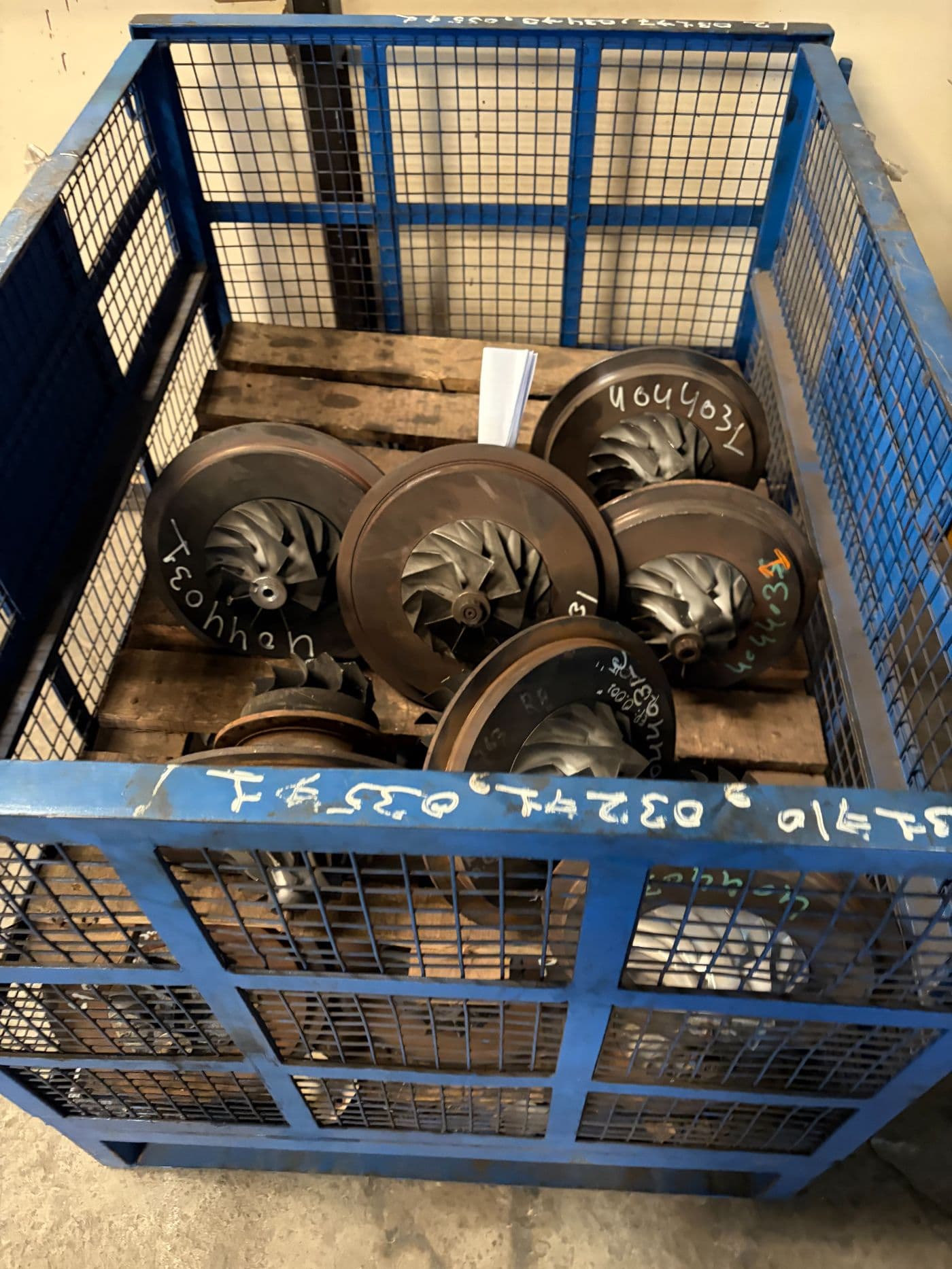 Reverse-engineered turbocharger cartridges and compressor wheels awaiting dispatch